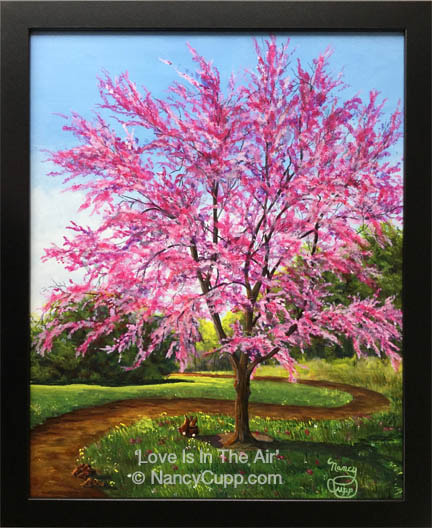 LOVE IS IN THE AIR acrylic painting by Nancy Cupp of a redbud tree at Riverbend Park near Findlay, Ohio.  There are two little lovey bunnies if you look close.